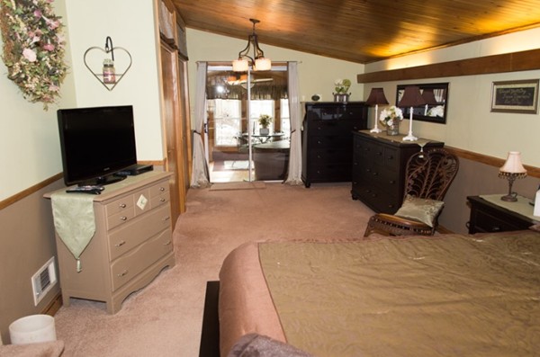 103 Chipaway Road Freetown, MA 02717 - Photo 14 of 26 a bed room with a bed and television