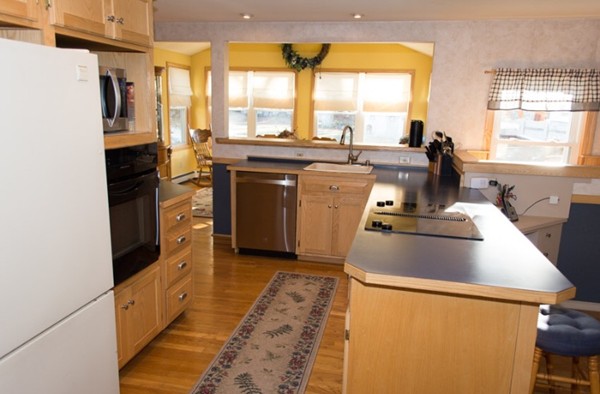103 Chipaway Road Freetown, MA 02717 - Photo 6 of 26 a kitchen with sink a stove and a refrigerator