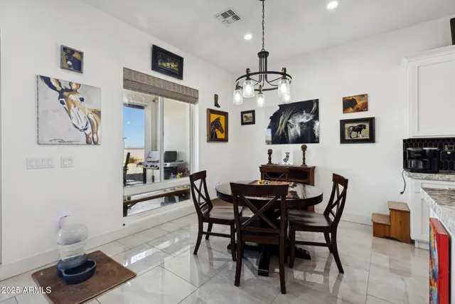 a large bathroom with a double vanity sink a mirror and a shower