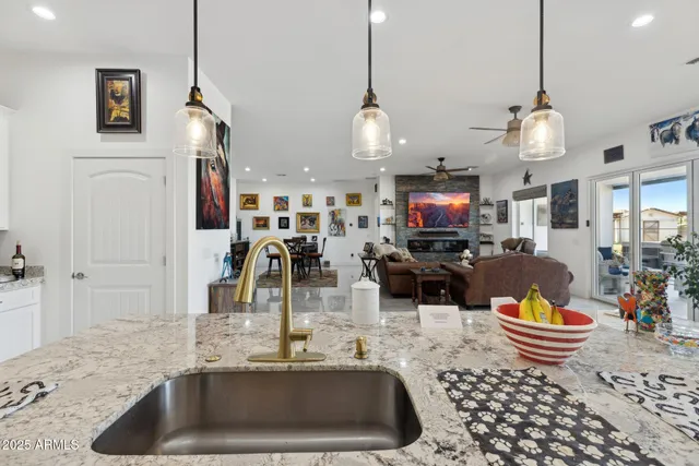 a bedroom with bed and a flat screen tv