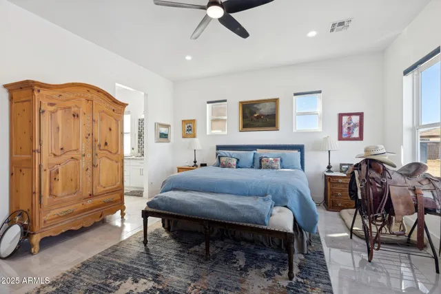 a view of a patio with a table and chairs