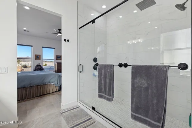 a view of a patio with a table and chairs