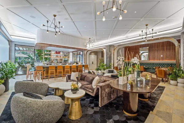 a outdoor space with lots of furniture and chandelier