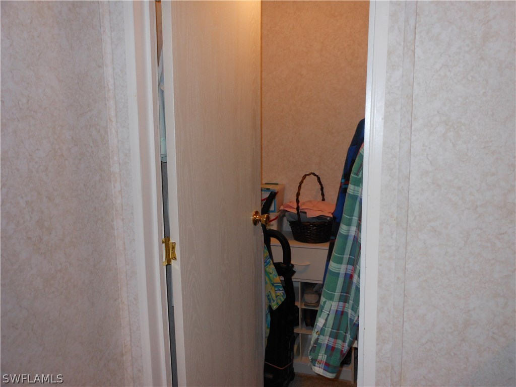 7664 Helen Road Bokeelia, FL 33922 - Photo 8 of 17 a view of a storage and utility room