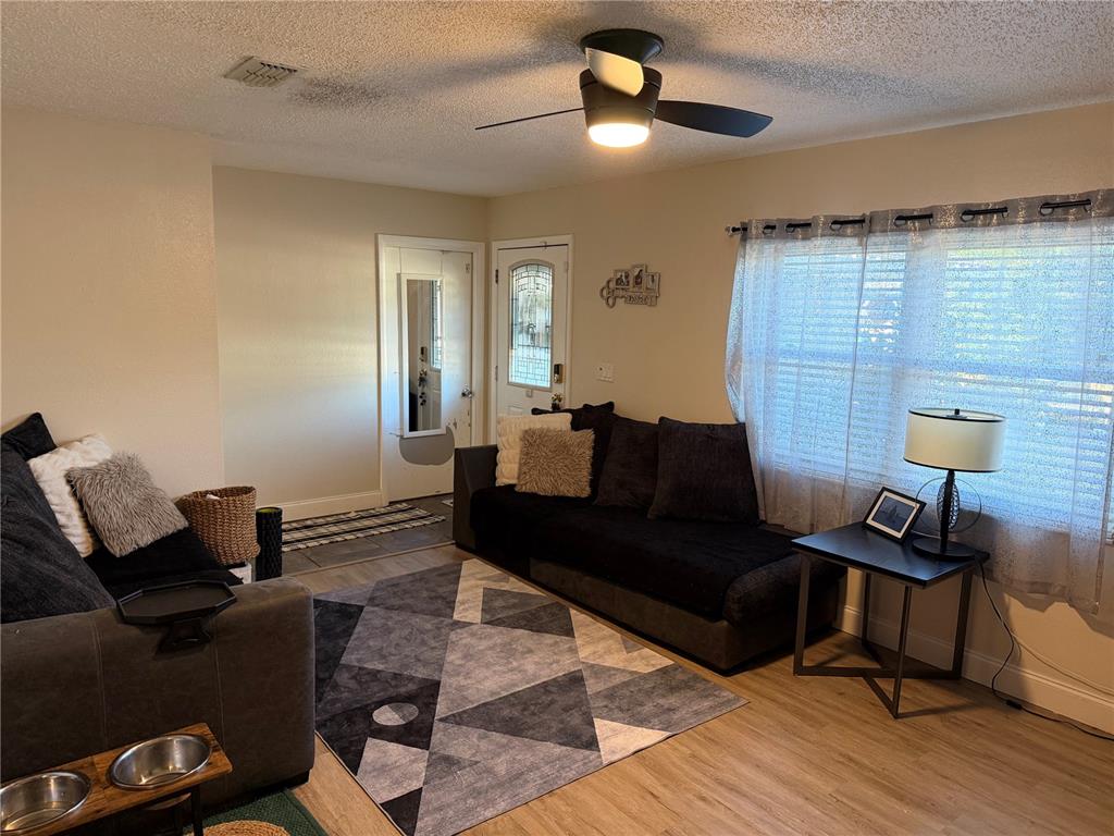 1150 Bentley Avenue Spring Hill, FL 34608 - Photo 3 of 11 a living room with furniture