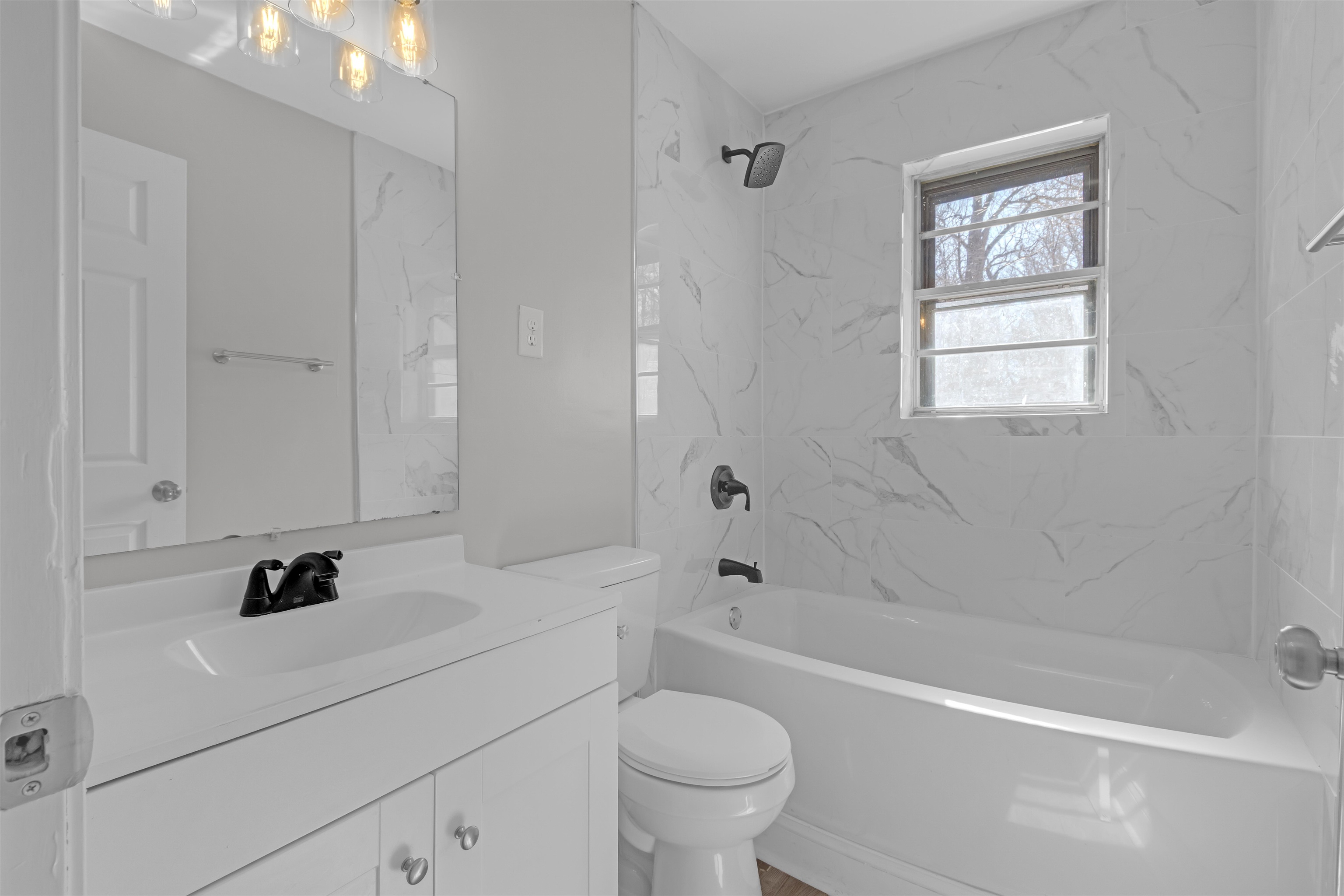 1296 Monasco Road Millington, TN 38053 - Photo 20 of 32 Bathroom featuring vanity and shower combination