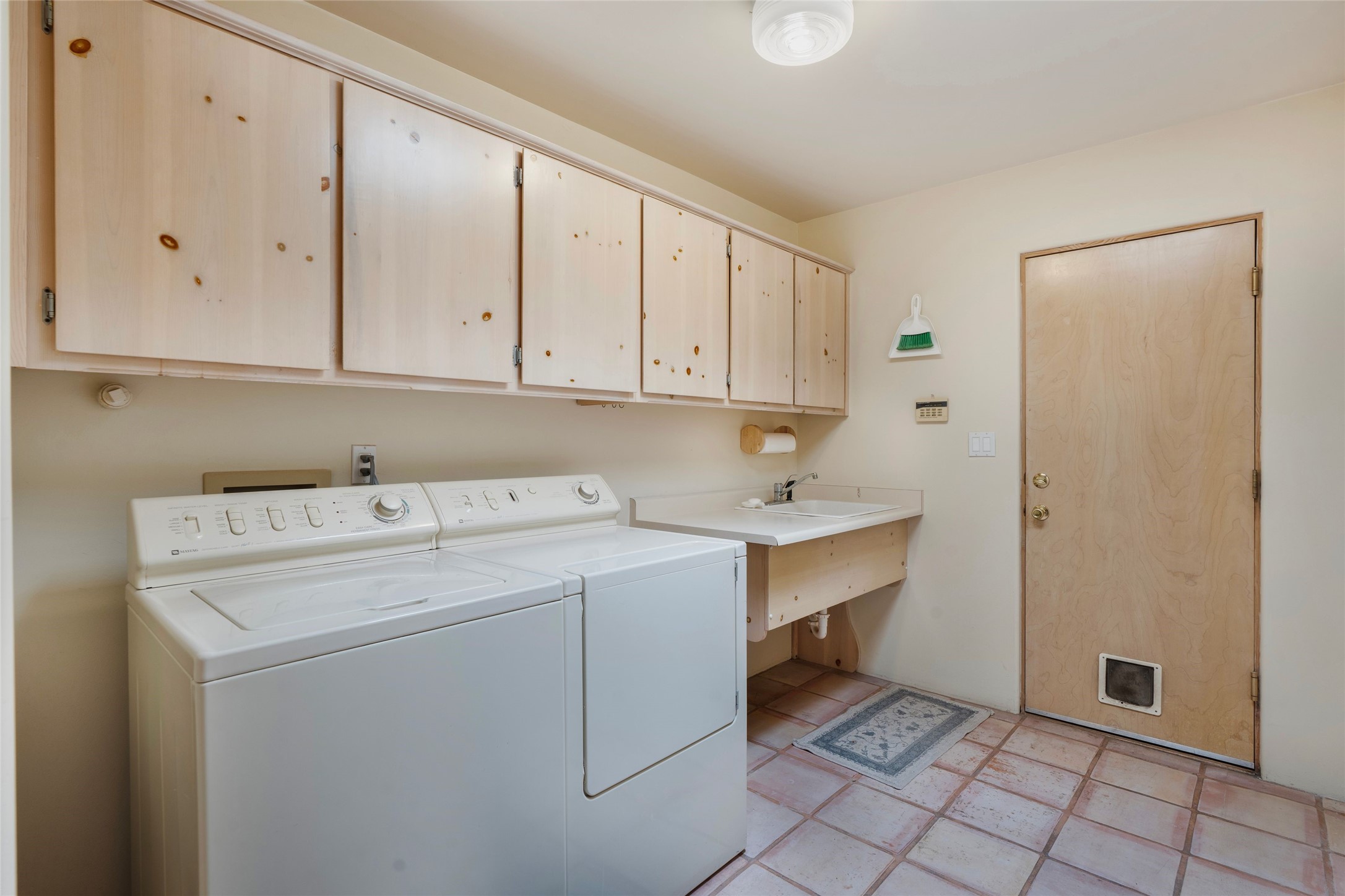 88 Monte Alto Road Santa Fe, NM 87508 - Photo 40 of 43 Laundry Room w/ utility sink & access to Garage