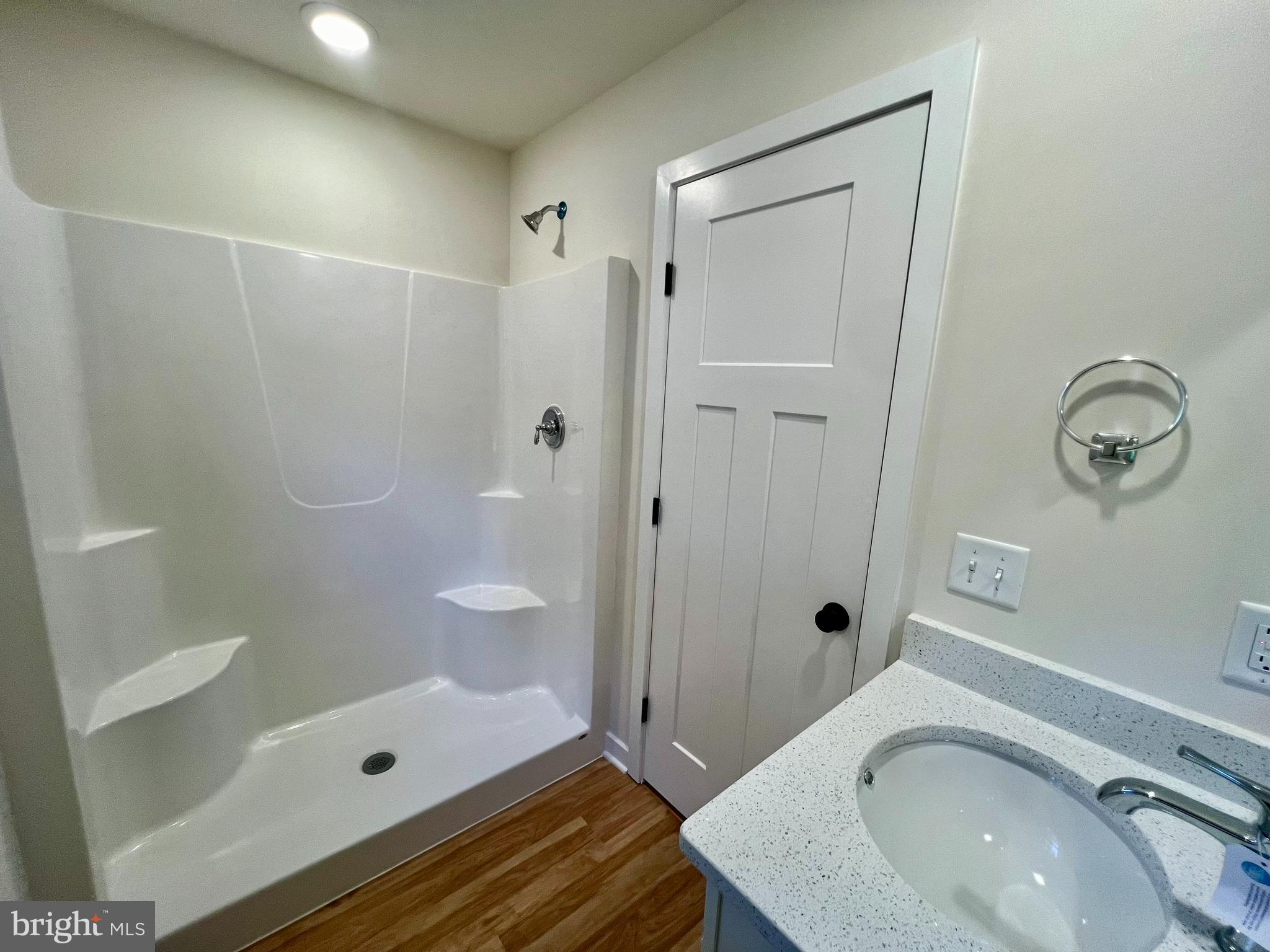 73 Azalea Way Colonial Beach, VA 22443 - Photo 13 of 13 a bathroom with a sink a toilet and shower