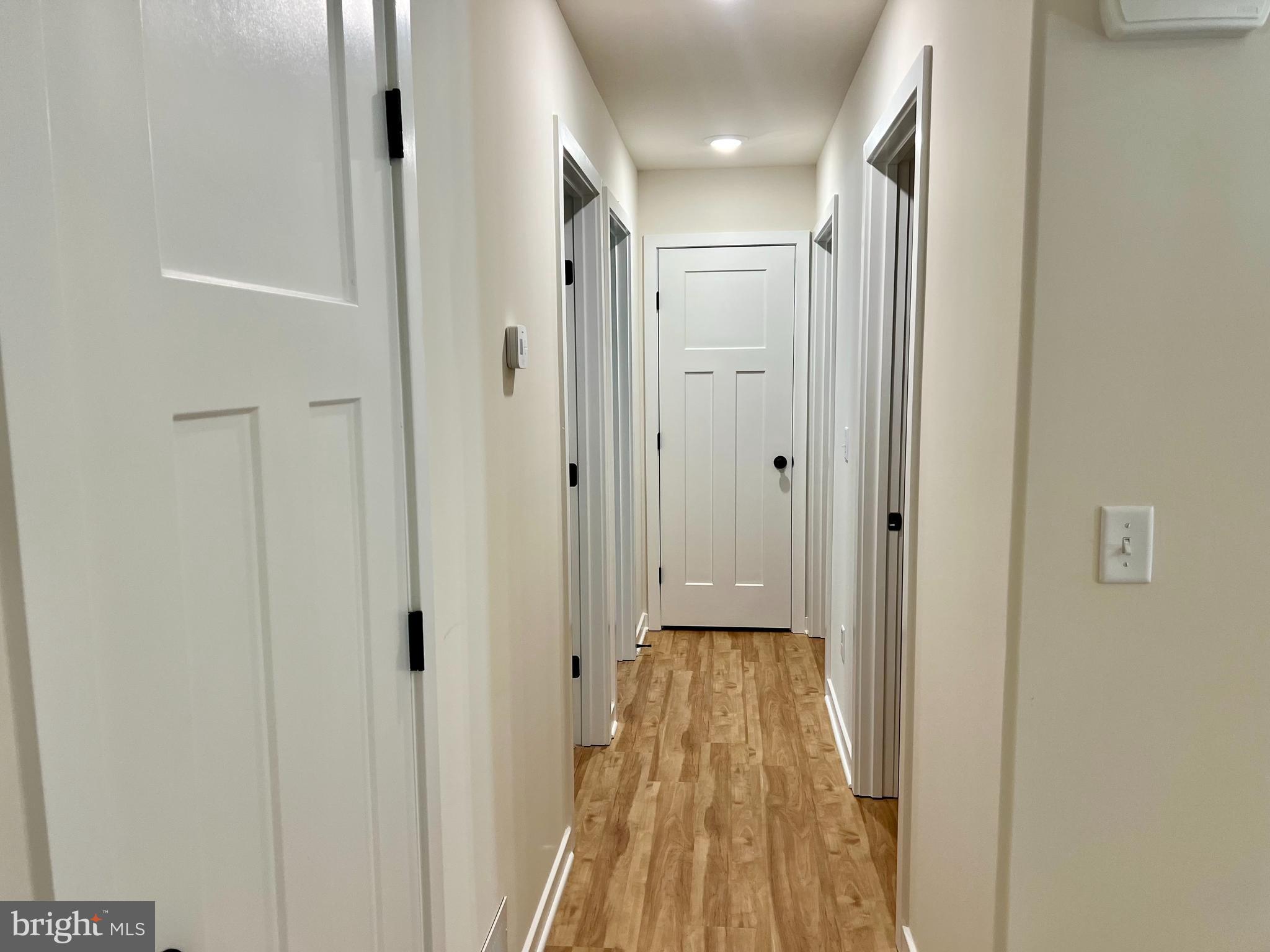 73 Azalea Way Colonial Beach, VA 22443 - Photo 10 of 13 a bathroom with a sink and a glass door