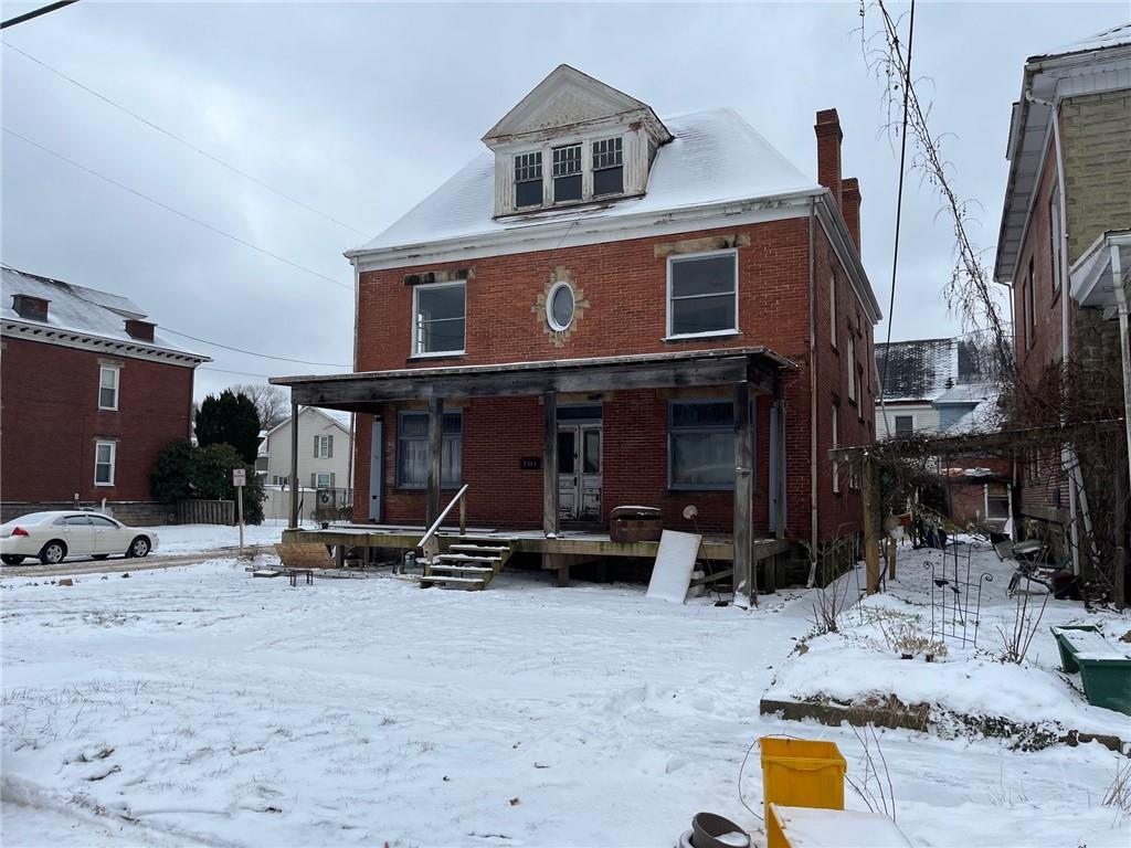 701 North McKean Street Kittanning, PA 16201 - Photo 1 of 25 a view of a car park in front of house