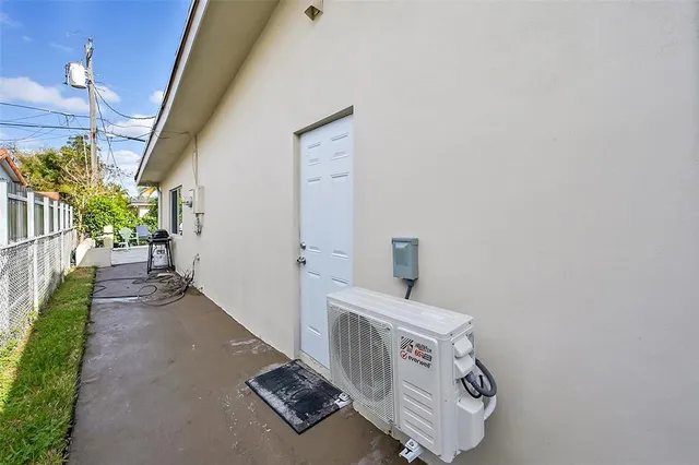 a view of a livingroom with furniture and stairs