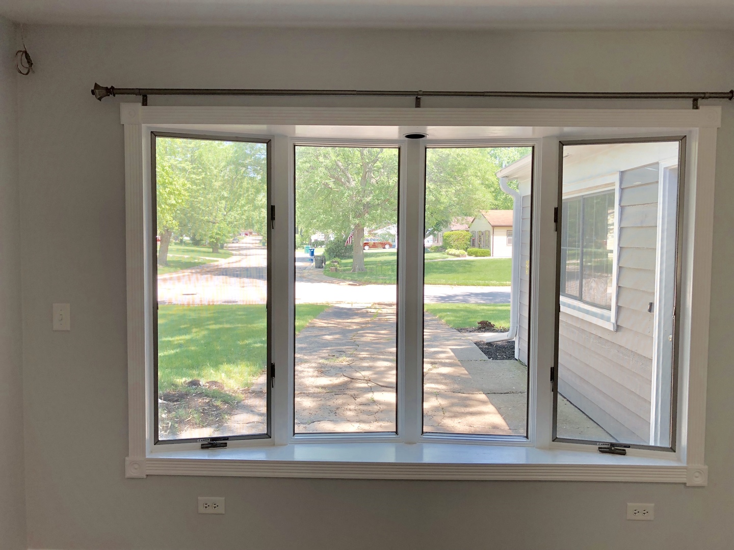 24 Pomeroy Road Montgomery, IL 60538 - Photo 14 of 29 a view of a room that has a bed and large windows