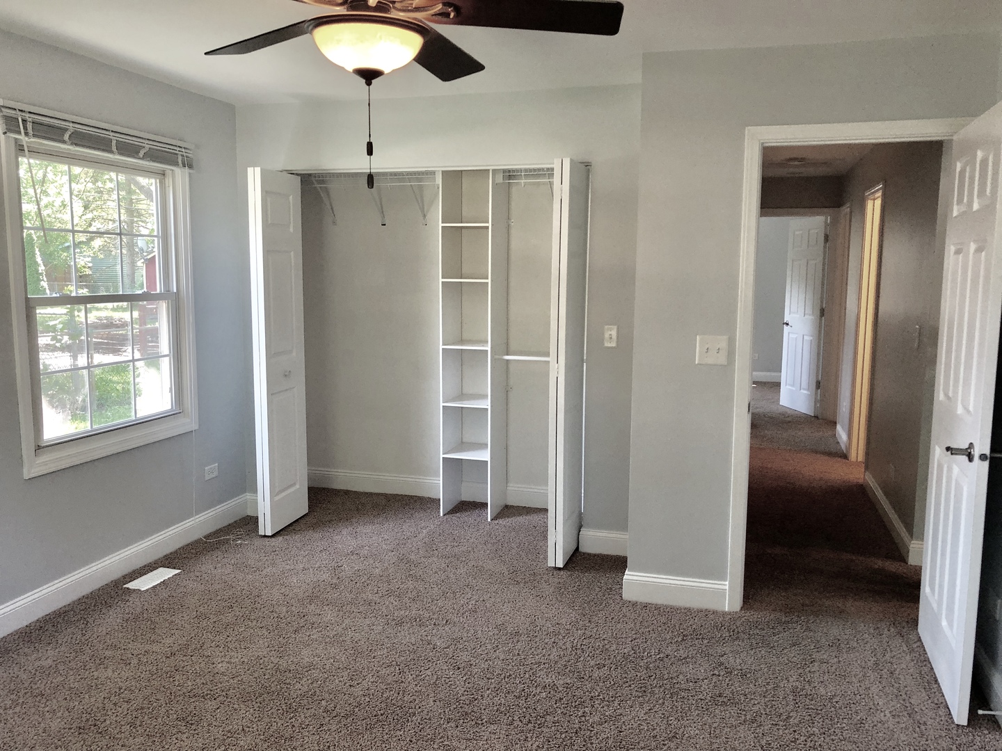 24 Pomeroy Road Montgomery, IL 60538 - Photo 15 of 29 an empty room with windows and closet