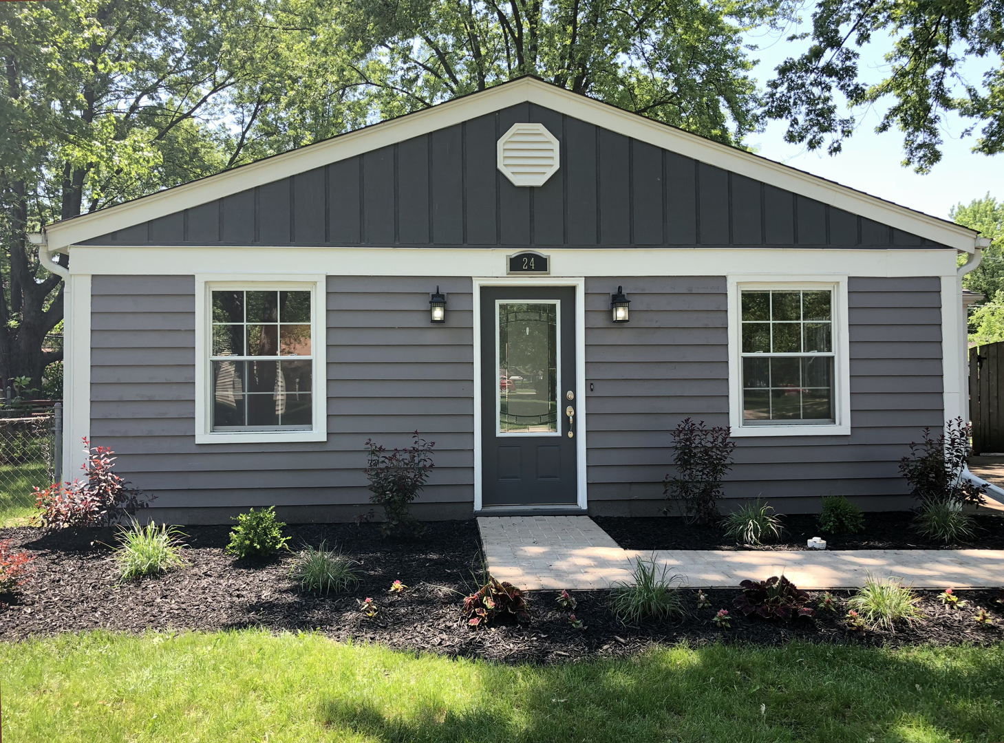 24 Pomeroy Road Montgomery, IL 60538 - Photo 3 of 29 a front view of a house with a yard