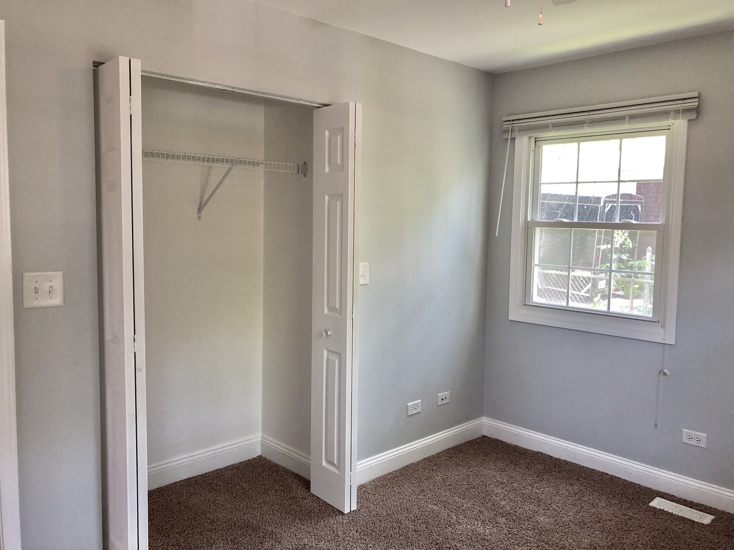 24 Pomeroy Road Montgomery, IL 60538 - Photo 21 of 29 a view of an empty room with a closet