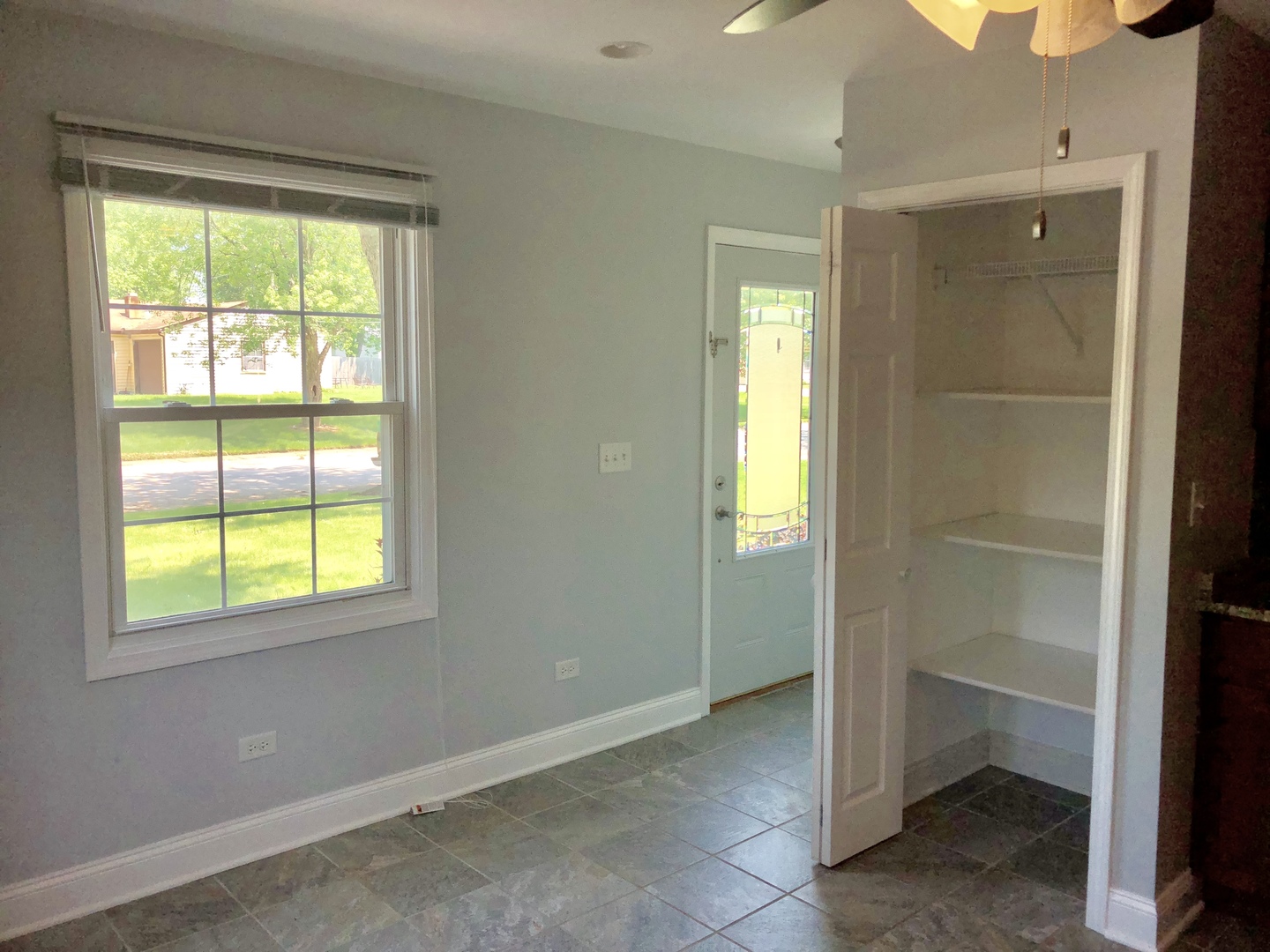 24 Pomeroy Road Montgomery, IL 60538 - Photo 5 of 29 a view of an empty room with a window