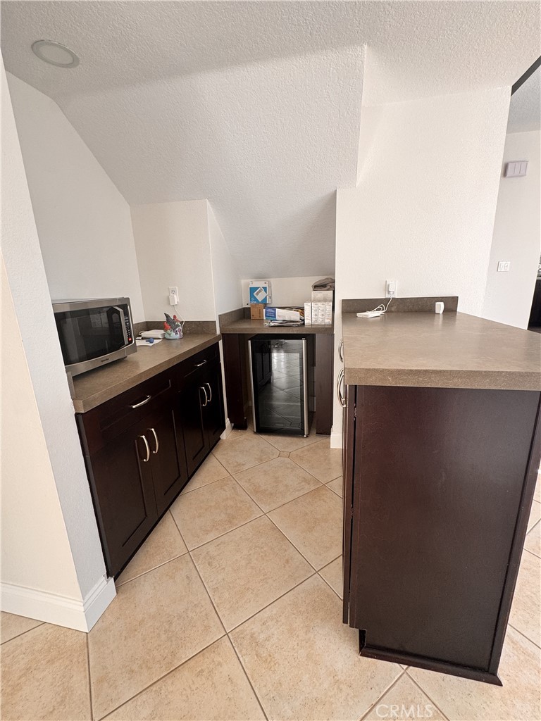 2008 Calle Francesca San Dimas, CA 91773 - Photo 7 of 25 a kitchen with a stove top oven and sink