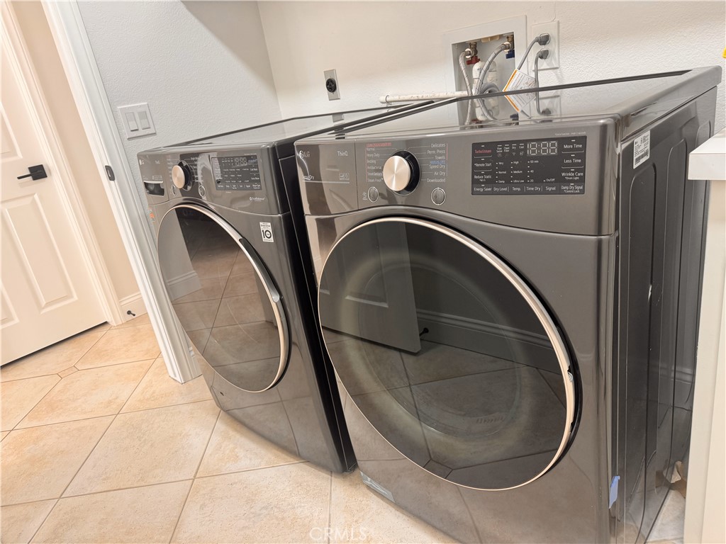 2008 Calle Francesca San Dimas, CA 91773 - Photo 8 of 25 a utility room with dryer and washer