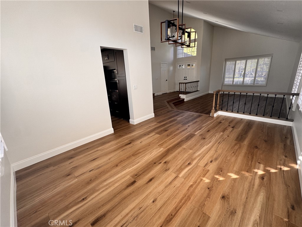 2008 Calle Francesca San Dimas, CA 91773 - Photo 9 of 25 wooden floor in an empty room with a window