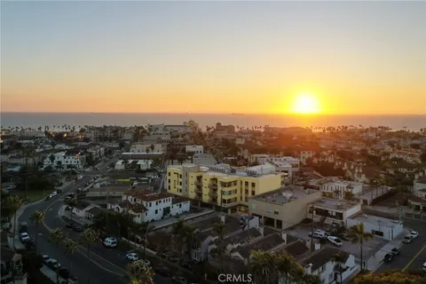a view of a balcony with two chairs
