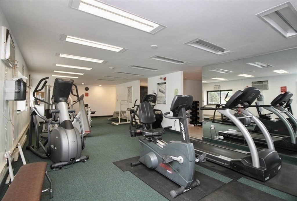 1321 Worcester Road, Unit 603 Framingham, MA 01701 - Photo 16 of 21 a room with gym equipment and lots of gym equipment