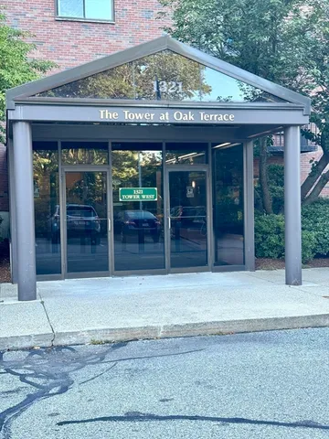 a front view of a building with glass door