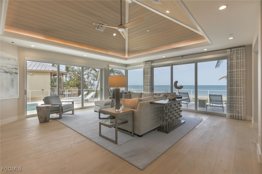 941 South Seas Plantation Road Captiva, FL 33924 - Photo 10 of 50 a living room with furniture and a large window