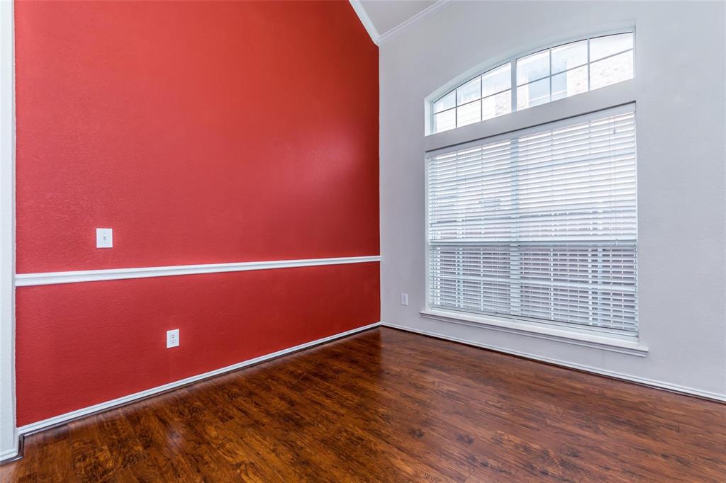 413 Sunrise Drive Allen, TX 75002 - Photo 12 of 23 an empty room with wooden floor and windows