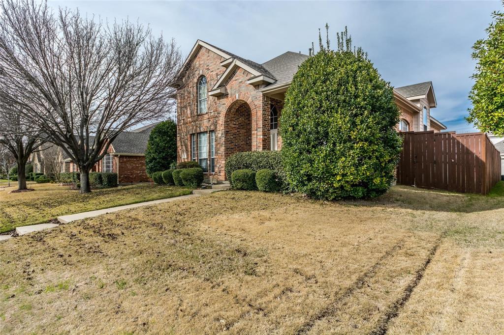 413 Sunrise Drive Allen, TX 75002 - Photo 2 of 23 a front view of a house with garden