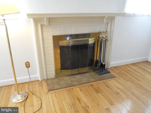 a view of an empty room with stairs