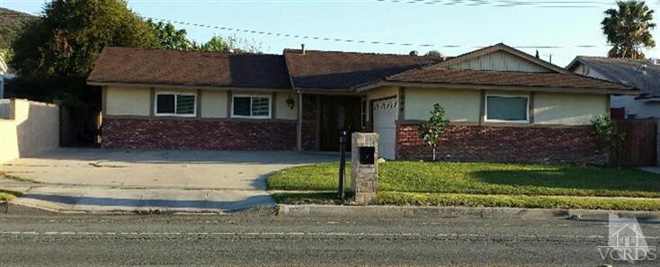 1684 Fitzgerald Road Simi Valley, CA 93065 - Photo 1 of 9 a front view of a house with garden