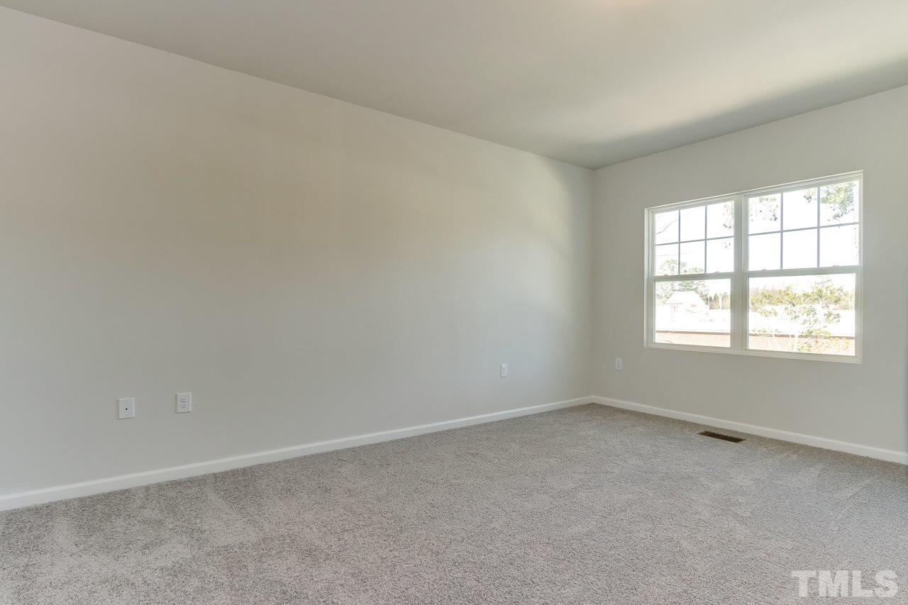6055 Beale Loop, Unit 25 ABBEY Raleigh, NC 27616 - Photo 14 of 27 an empty room with a window