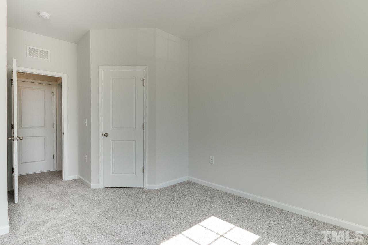 6055 Beale Loop, Unit 25 ABBEY Raleigh, NC 27616 - Photo 19 of 27 a view of an empty room