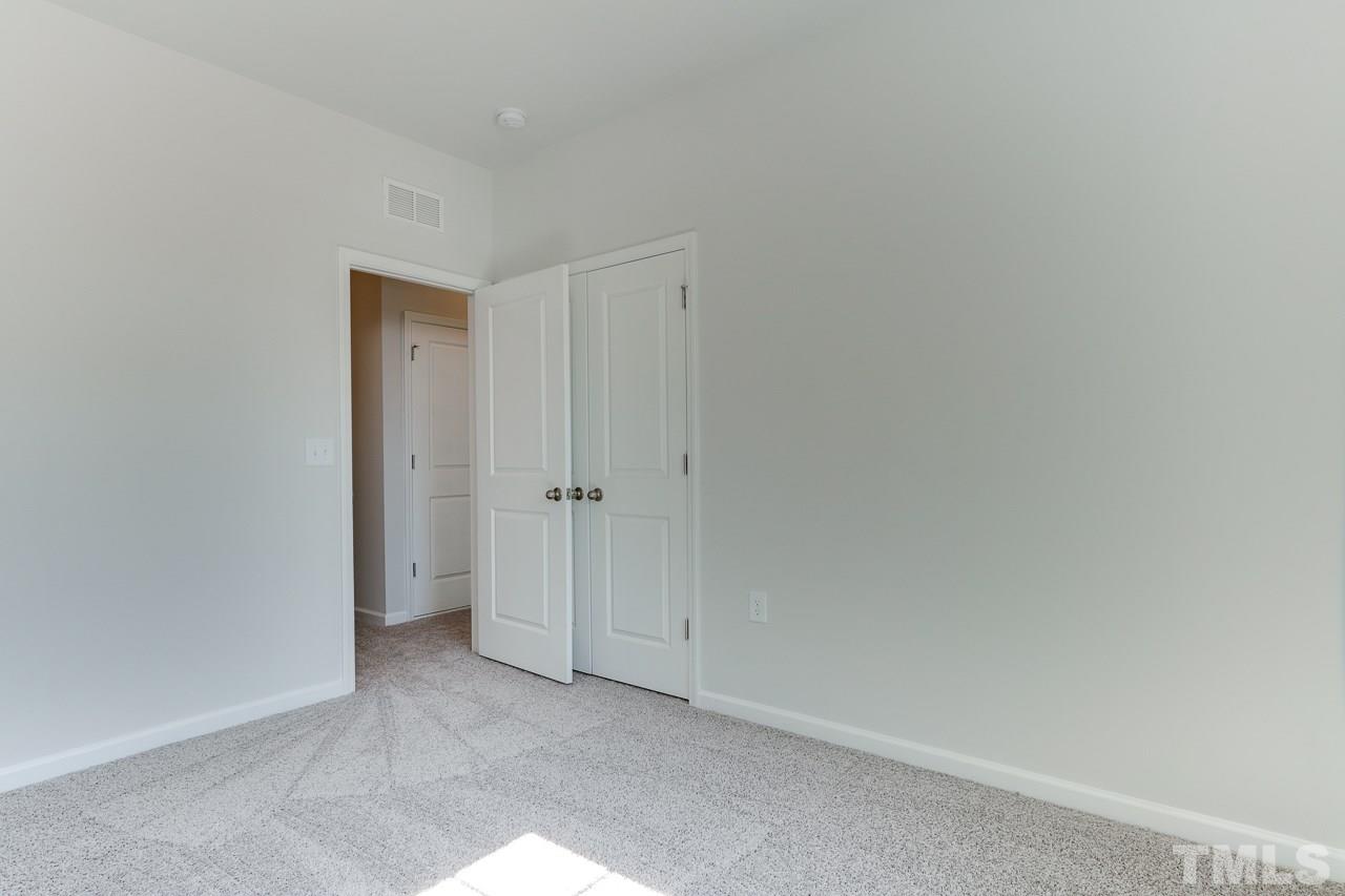 6055 Beale Loop, Unit 25 ABBEY Raleigh, NC 27616 - Photo 21 of 27 a view of an empty room