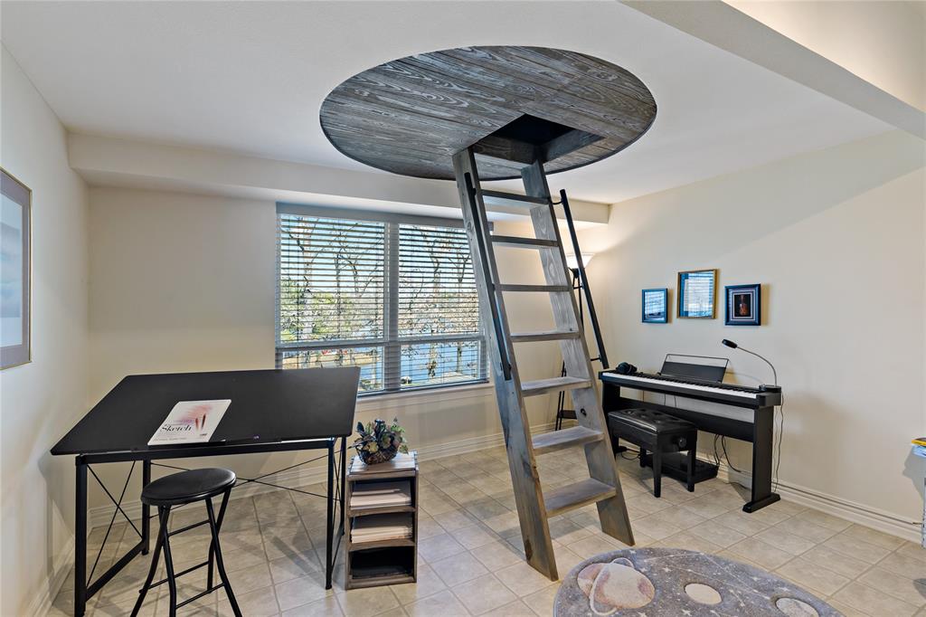 571 Hidden Lake Drive Powderly, TX 75473 - Photo 18 of 40 a living room with furniture and a window