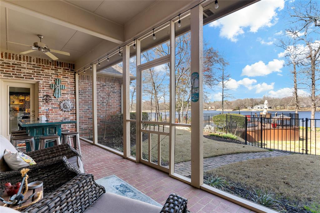 571 Hidden Lake Drive Powderly, TX 75473 - Photo 29 of 40 a balcony view with a glass door