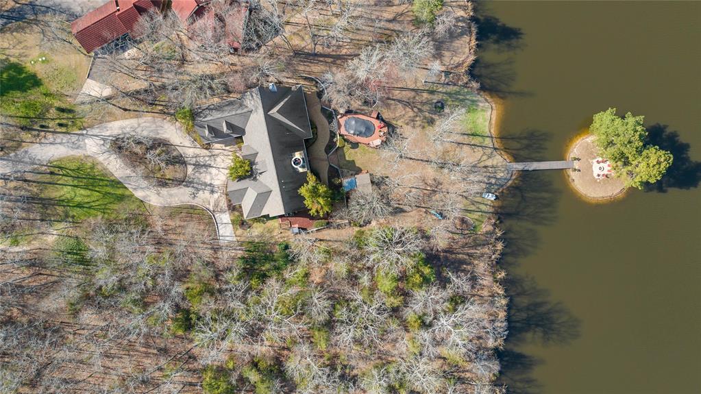571 Hidden Lake Drive Powderly, TX 75473 - Photo 36 of 40 a aerial view of a house with a yard