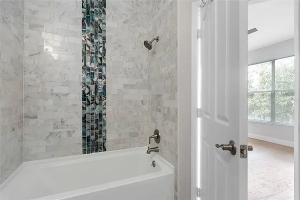 a bathroom with a bathtub