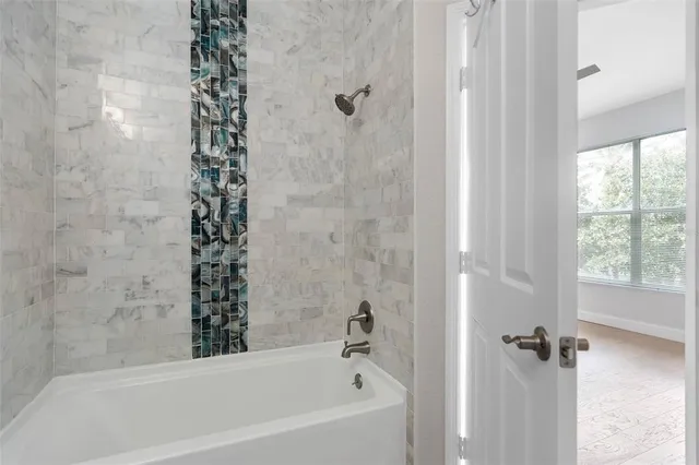 a bathroom with a bathtub