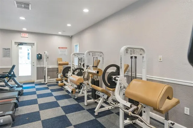 a view of a room with gym equipment