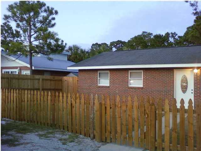 2634 Hwy Santa Rosa Beach, Unit 30A Santa Rosa Beach, FL 32459 - Photo 1 of 12 a aerial view of a house with a yard