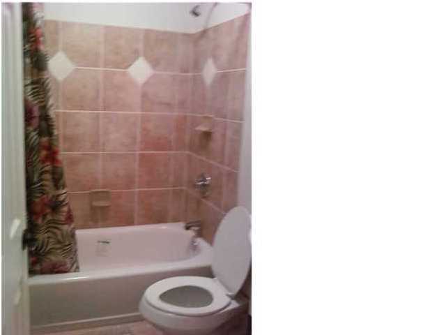 2634 Hwy Santa Rosa Beach, Unit 30A Santa Rosa Beach, FL 32459 - Photo 11 of 12 a bathroom with a bathtub and a toilet