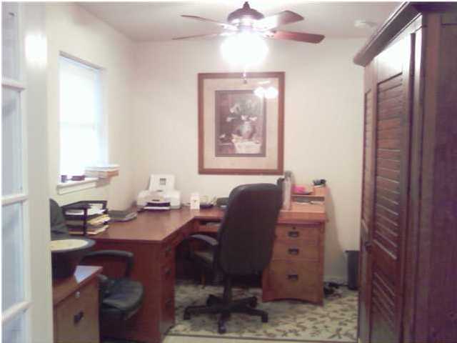 2634 Hwy Santa Rosa Beach, Unit 30A Santa Rosa Beach, FL 32459 - Photo 10 of 12 a view of a workspace with furniture and a window