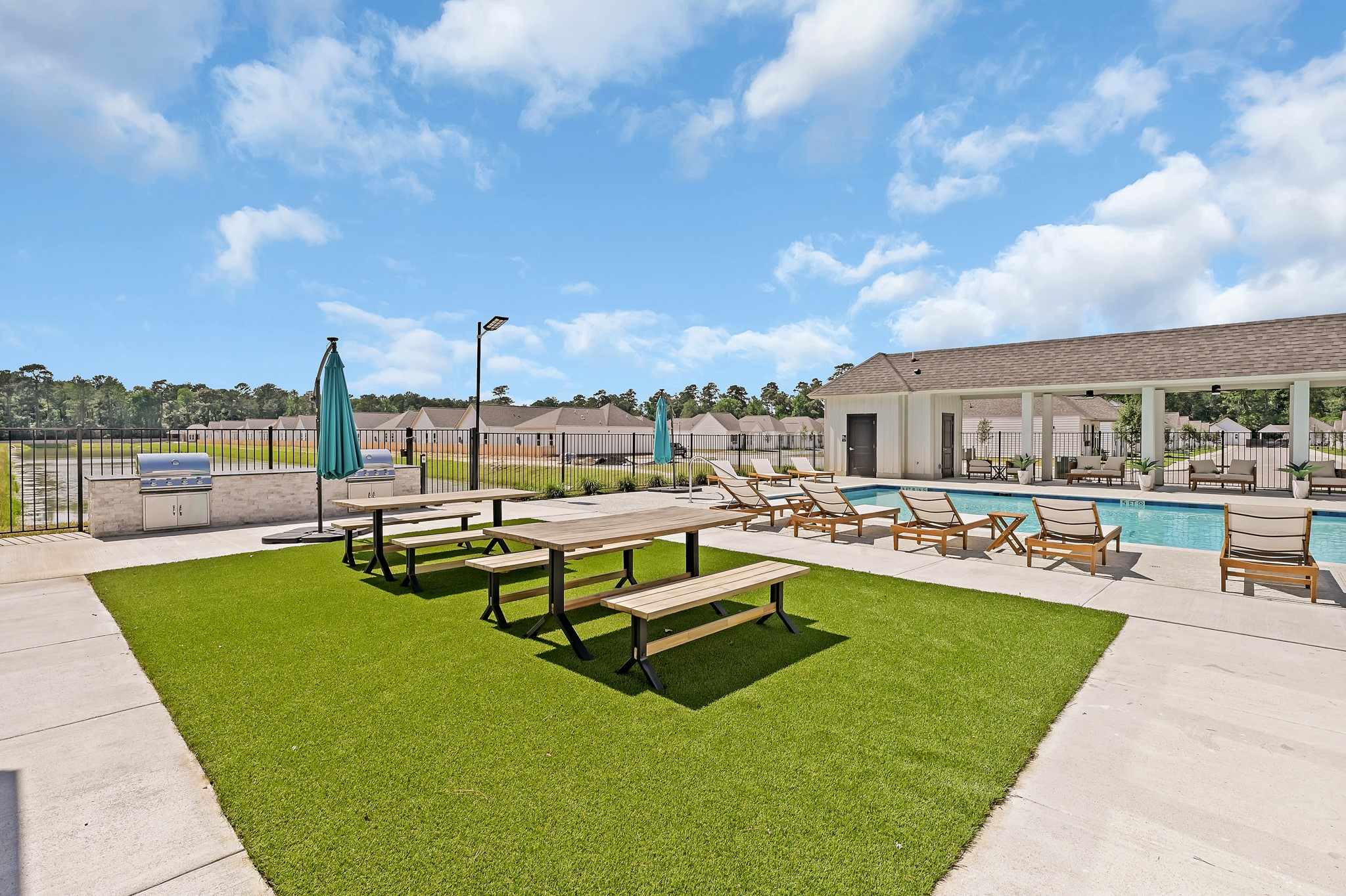 33455 Buckshot Lane, Unit 67 Spring, TX 77382 - Photo 17 of 22 a view of a swimming pool with outdoor seating space
