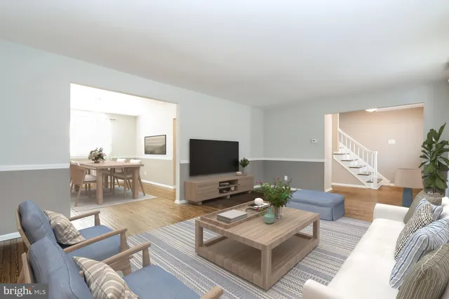 a living room with furniture and a couch