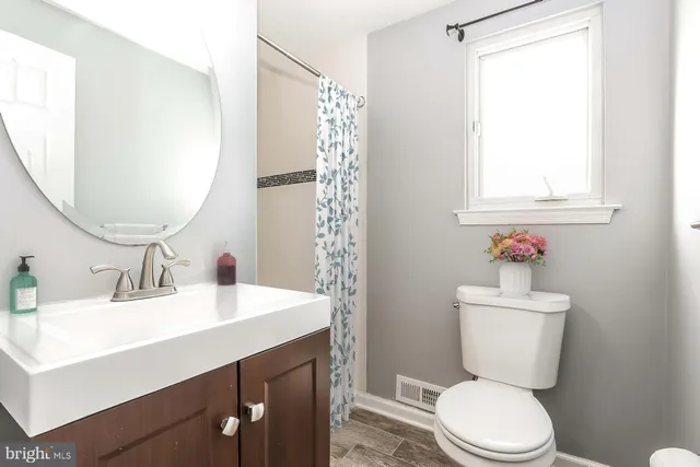 a large white bed in a white room