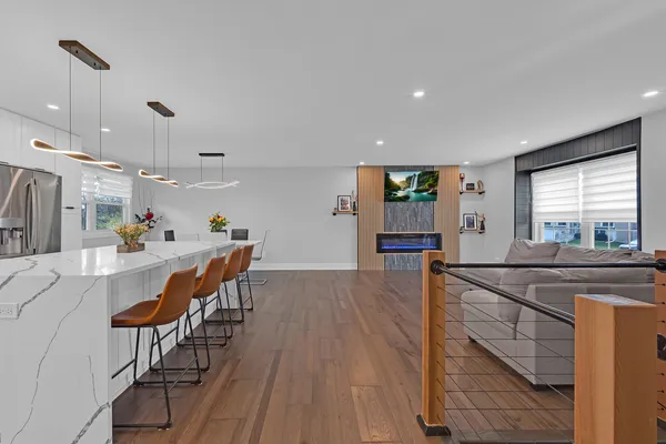 a view of a kitchen and dining room