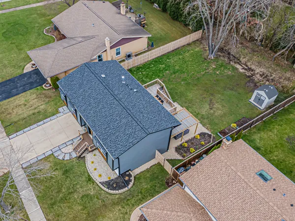 a view of a house with a back yard