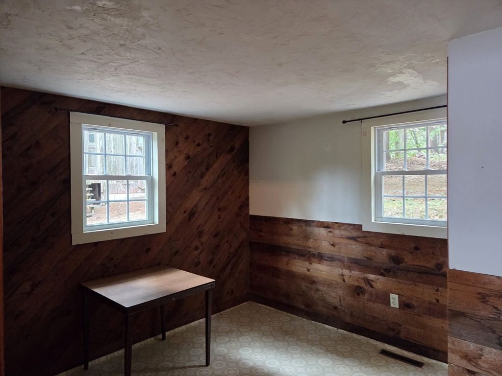 659 Reservoir Road Lunenburg, MA 01462 - Photo 15 of 41 a room with furniture and a window