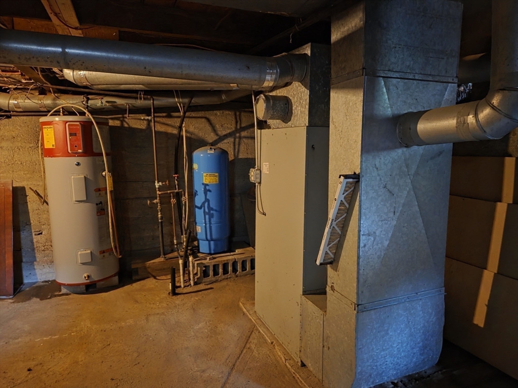 659 Reservoir Road Lunenburg, MA 01462 - Photo 18 of 41 a view of walk in closet with clothes